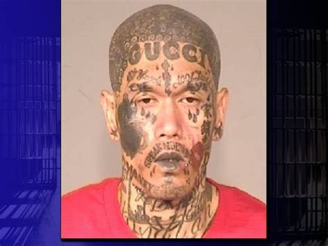 gucci face tattoo fresno|Gang member with face emblazoned with Gucci tattoo arrested .